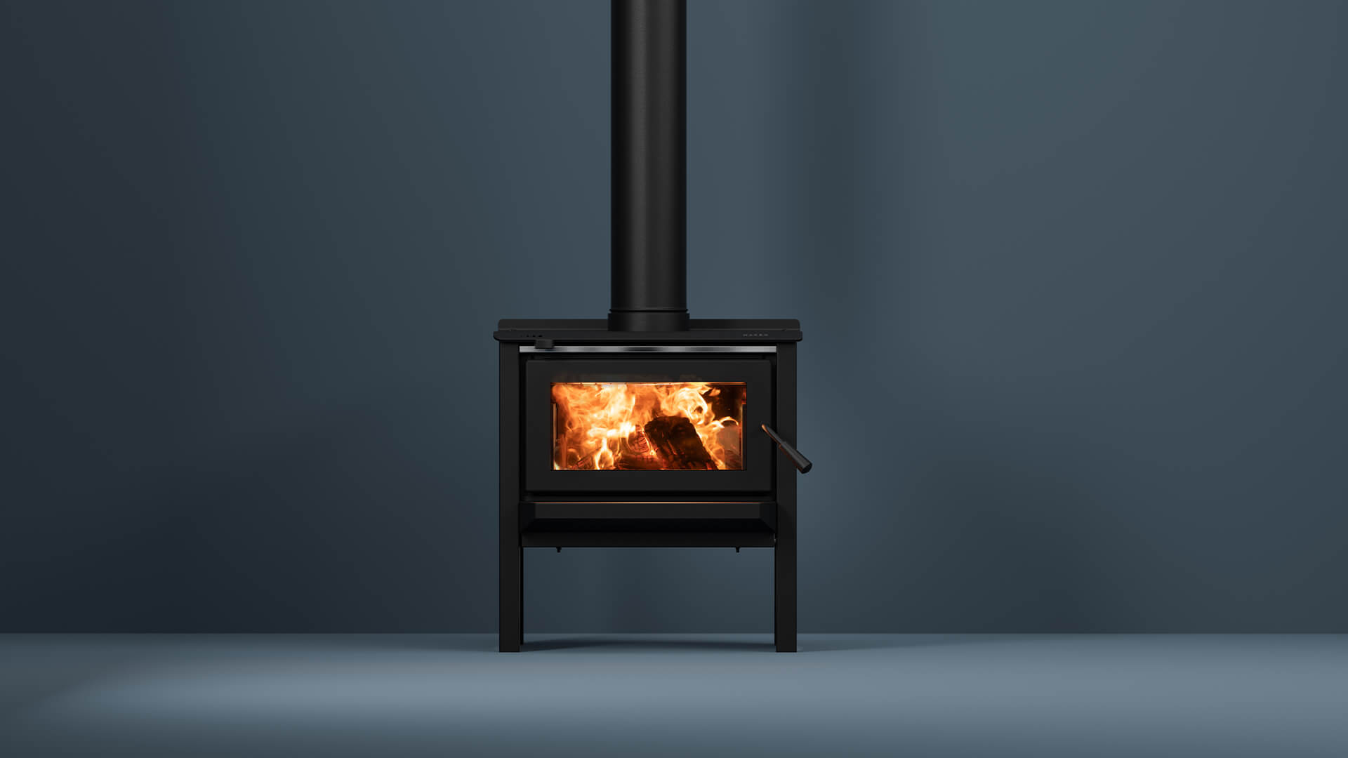 Maxen Henley 250 with Legs Base Wood Fireplace in navy coloured room